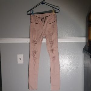 Rose gold ripped jeans